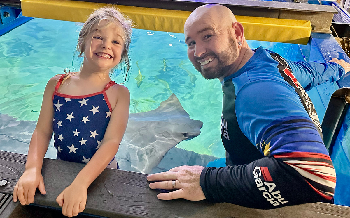 Visitors enjoying a unique aquarium experience near Crystal River